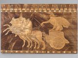 an image of a wooden box with a picture of a man on a horse drawn carriage