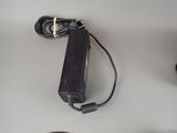 a picture of a nintendo wii game controller and charger