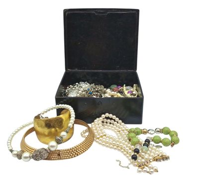 a black box with a bunch of jewelry inside of it