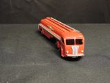a toy fire truck that is sitting on a table