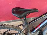 a bike that is sitting on the floor next to a wall