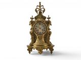 a gold clock that is sitting on a stand