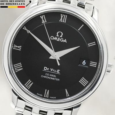 an image of a close up of a wrist watch with roman numerals