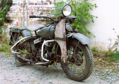 a motorcycle that is parked on the side of the road