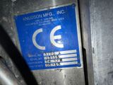 a blue sign on the side of a building