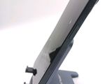a close up of a cell phone on a stand
