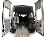 a white van with a ramp in the back of it