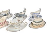 five different types of porcelain dishes and saucers