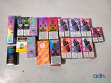 a lot of cigarettes and cigarettes on the table
