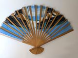 a fan that is hanging on the wall in the room