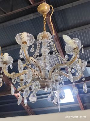 a chandelier hanging from the ceiling in a store