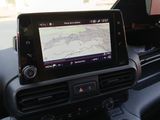 the dashboard of a car with a gps device in it