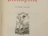an old book with a picture of a woman on it