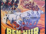 an old movie poster of a horse drawn carriage being pulled by two men