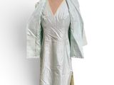 an image of a white dress on a mannequin