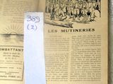 un livre sur lequel se trouve une feuille de papier en haut et une autre en bas
