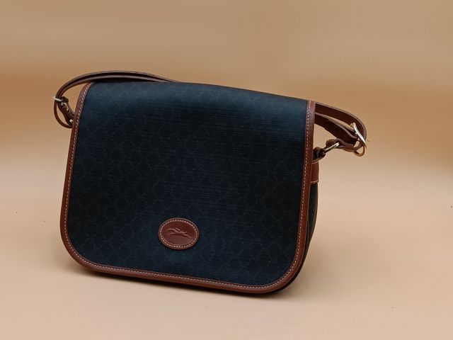 LONGCHAMPS – Sac en toile et cuir porté main et épaule. État neuf