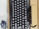 a box that has a keyboard in it on a table