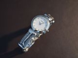 a close up of a wrist watch on a table