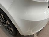 a close up of a car ' s front bumper