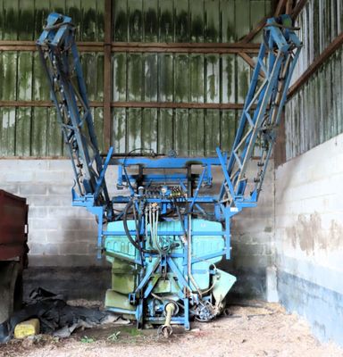 a blue crane that is sitting in a building
