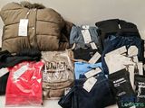 a pile of clothing that is sitting on a table