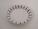 a close up of a plate on a table with a white background