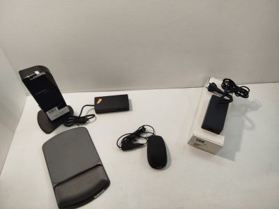 a cell phone and a charger on a table
