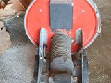 a red machine that is sitting on a table