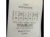 a close up of a label on the back of a shirt