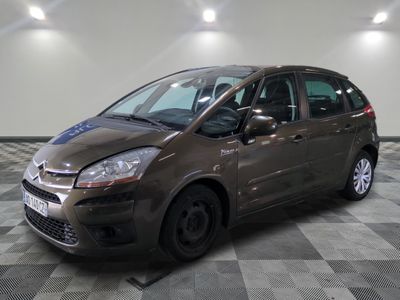 a picture of a car that is parked in a garage