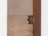 a picture of a piece of wood with a hole in it