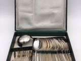 silver plated flatware set in a black case with silverware