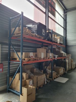 many boxes and boxes on the shelves in the warehouse