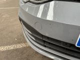 a close up of a car with a license plate on the front of it