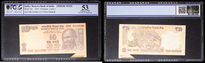 two different types of currency are displayed on a black and white background