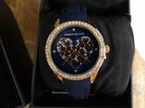 michael korsch watch with blue strap and crystal bezel