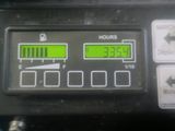 a close up of a clock on the side of a vehicle