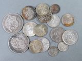 a lot of coins that are sitting on a table