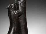 an image of a bronze sculpture of a man holding a woman ' s hand