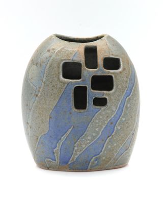 a small vase with a blue and black design on it