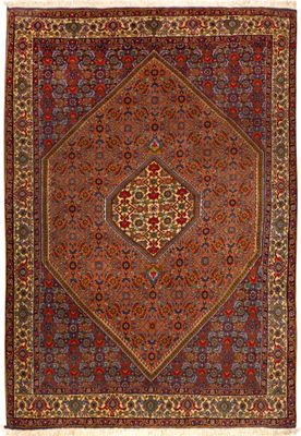 un tapis rouge et bleu à motifs de médaillons