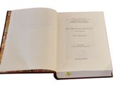 an open book that is sitting on a table