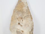 an image of a piece of rock on a white surface