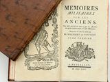 an old book with a picture of a man riding a horse