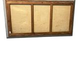 an image of a window with a wooden frame and a window pane