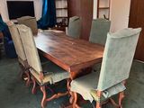 a dining room with a table and chairs in it