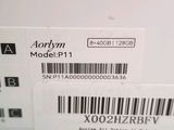 a label on the back of a white refrigerator