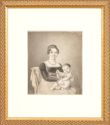 portrait of a woman holding a baby in her lap