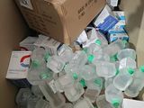 a box full of empty water bottles and a box of empty water bottles